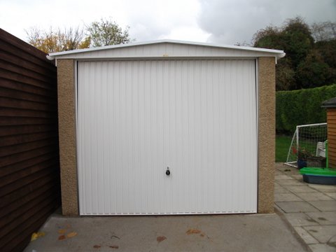 Fairford Concrete Garage on driveway - front view of the Fairford Garge with a up and over door