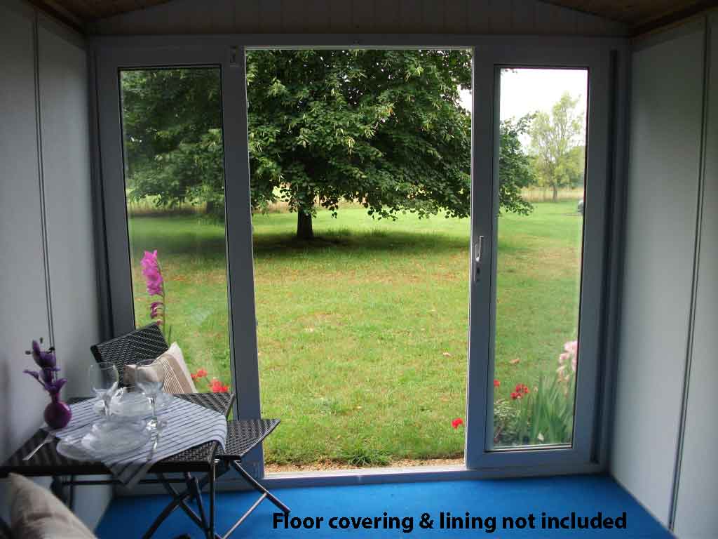 Inside Cheltenham Garden Room showing a table and two chairs. Floor covering and lining not included