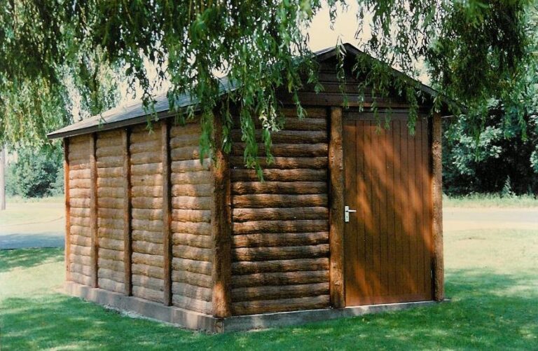 Concrete Garages and concrete sheds, concrete workshops, concrete buildings - A post and panel concrete building in log effect